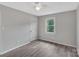 Spacious bedroom with wood-look floors and ceiling fan at 511 Colorado Trl, Lincolnton, NC 28092