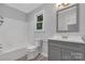 Updated bathroom with gray vanity and shower/tub at 511 Colorado Trl, Lincolnton, NC 28092