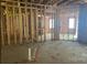 Interior framing of a new house, showing the structure and electrical work in progress at 760 Bellegray Rd # 9, Clover, SC 29710