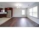 Bright dining room with hardwood floors and a chandelier at 4616 Canal Rd, Marshville, NC 28103