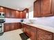 Modern kitchen with granite countertops and dark wood cabinets at 4616 Canal Rd, Marshville, NC 28103