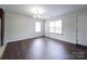 Spacious dining area featuring hardwood floors and natural light at 4616 Canal Rd, Marshville, NC 28103
