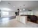 Open concept kitchen island with granite countertops at 4616 Canal Rd, Marshville, NC 28103