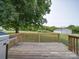 Wooden deck with grill and backyard view at 4616 Canal Rd, Marshville, NC 28103