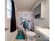 Clean bathroom with a shower/tub and a turtle-themed shower curtain at 4616 Canal Rd, Marshville, NC 28103