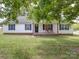 White home with covered porch, and landscaping at 4616 Canal Rd, Marshville, NC 28103