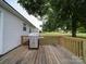 Wooden deck with built-in grill and backyard view at 4616 Canal Rd, Marshville, NC 28103