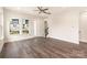 Bright living room featuring hardwood floors and a staircase at 425 Nathaniel Way # Brx0031, Charlotte, NC 28213