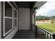 Private patio with view of backyard and trees at 433 Nathaniel Way # Brx0033, Charlotte, NC 28213