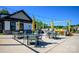 Outdoor kitchen and dining area with grills and seating at 1110 Lowland Way, Waxhaw, NC 28173