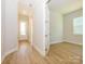 Bright entryway with hardwood floors and access to an office at 1110 Lowland Way, Waxhaw, NC 28173