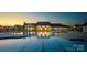 Community lap pool with surrounding lounge area at 1110 Lowland Way, Waxhaw, NC 28173