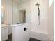 Clean and modern walk-in shower with subway tile and built-in bench at 1110 Lowland Way, Waxhaw, NC 28173