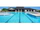 Community lap pool with plenty of deck space for relaxation at 1110 Lowland Way, Waxhaw, NC 28173