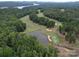 Aerial view of golf course and lake at 165 Old Harbor Dr, Mount Gilead, NC 27306