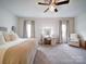 Bright bedroom featuring a cozy bed and ample natural light at 165 Old Harbor Dr, Mount Gilead, NC 27306