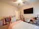 Charming bedroom with daisies wall decor and built in desk at 165 Old Harbor Dr, Mount Gilead, NC 27306