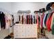 Large walk-in closet with ample shelving and drawer space at 165 Old Harbor Dr, Mount Gilead, NC 27306