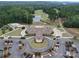 Community clubhouse with parking and pool view at 165 Old Harbor Dr, Mount Gilead, NC 27306