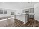 Modern kitchen featuring gray cabinets, quartz countertops, and an island at 2223 Carpenter Farms Dr, Lincolnton, NC 28092