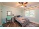 Bedroom with a bed, desk, and ceiling fan at 1936 46Th Avenue Ne Dr, Hickory, NC 28601