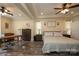 Large main bedroom with a king-size bed, a walk-in closet, and an office area at 1936 46Th Avenue Ne Dr, Hickory, NC 28601