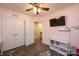 Bedroom with a TV, closet, and wood-look flooring at 1936 46Th Avenue Ne Dr, Hickory, NC 28601