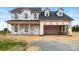 New house under construction, gray siding, cedar doors and shutters at 4218 Old Monroe Marshville Rd, Wingate, NC 28174