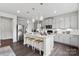 Modern kitchen with stainless steel appliances and an island at 7055 Stella Pl, Stanley, NC 28164