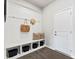 Bright entry with built-in bench and storage at 7055 Stella Pl, Stanley, NC 28164