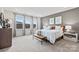 Spacious bedroom with large windows and plush carpet at 7055 Stella Pl, Stanley, NC 28164
