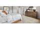Main bedroom with dresser and ensuite bathroom access at 7055 Stella Pl, Stanley, NC 28164