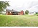 Brick home with deck overlooking the backyard at 7111 Highway 218 Hwy, Marshville, NC 28103