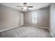 Cozy bedroom with ceiling fan and a single window at 5811 Creft Cir, Indian Trail, NC 28079