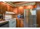 Kitchen area with wood cabinets, and stainless steel appliances at 4537 Sunrise Beach Rd, Catawba, NC 28609