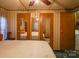 Primary bedroom with large bed and multiple mirrored closets at 4537 Sunrise Beach Rd, Catawba, NC 28609
