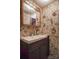 Bathroom with single vanity and floral wallpaper at 4537 Sunrise Beach Rd, Catawba, NC 28609