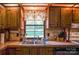 Kitchen sink and countertop with wood cabinets at 4537 Sunrise Beach Rd, Catawba, NC 28609