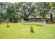 Large backyard with chain-link fence and shed at 4537 Sunrise Beach Rd, Catawba, NC 28609