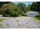 Gravel driveway and detached garage in the front yard at 4537 Sunrise Beach Rd, Catawba, NC 28609
