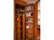 Wood pantry with shelving for storage at 4537 Sunrise Beach Rd, Catawba, NC 28609