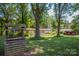 Mature trees and a well enhance the curb appeal of this property at 4537 Sunrise Beach Rd, Catawba, NC 28609