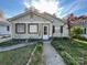 Nice curb appeal with a landscaped yard and walkway at 412 E 18Th St, Charlotte, NC 28206