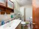 Clean bathroom with a shower/tub combo and vanity at 412 E 18Th St, Charlotte, NC 28206