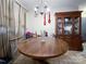 Dining area featuring a round table and a china cabinet at 412 E 18Th St, Charlotte, NC 28206