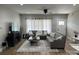 Spacious living room with sectional sofa, large TV, and fireplace at 4050 Fairview Ln, Maiden, NC 28650
