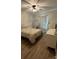 Bright bedroom with a queen-size bed, light flooring, and ample closet space at 4050 Fairview Ln, Maiden, NC 28650
