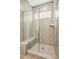 Large walk-in shower with tile surround and seat at 5128 Hales Ford Rd # 030, Charlotte, NC 28215