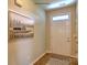 Light and airy entryway featuring wood-look floors and a neutral color palette at 1421 6Th Ne St, Hickory, NC 28601