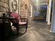 Front porch with wicker chair and a view of a porch swing at 84 Walnut Ave, Gastonia, NC 28054